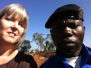 Deb and a police officer from Democratic Republic of the Congo